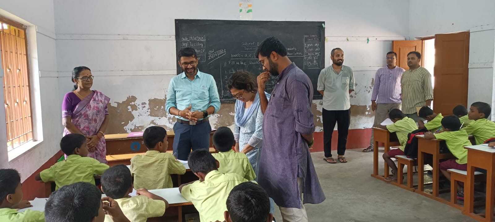 ICRA volunteers and teachers during a classroom visit